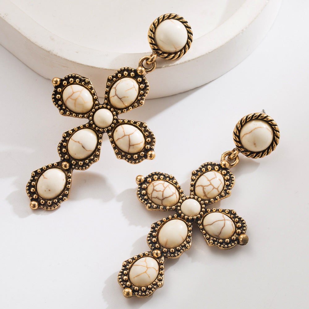 Wholesale Western style oval exaggerated cross earrings with white turquoise